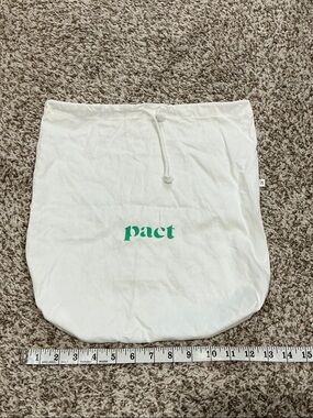 Pact Natural Canvas Drawstring Pouch with Green Logo